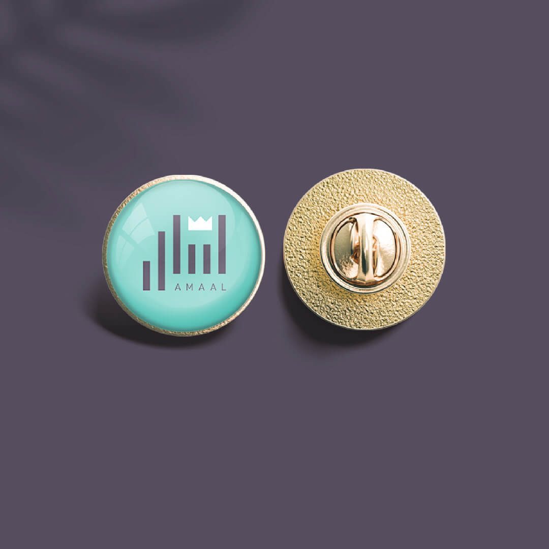 Amal-lawyer-Branding-suit-pin-logo-talks